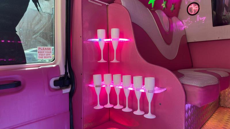 Pink party bus champagne area - luxury refreshment station